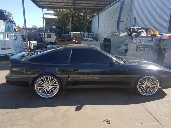 Adding dark window tint to this car makes the vehicle look great and the wheels stand out